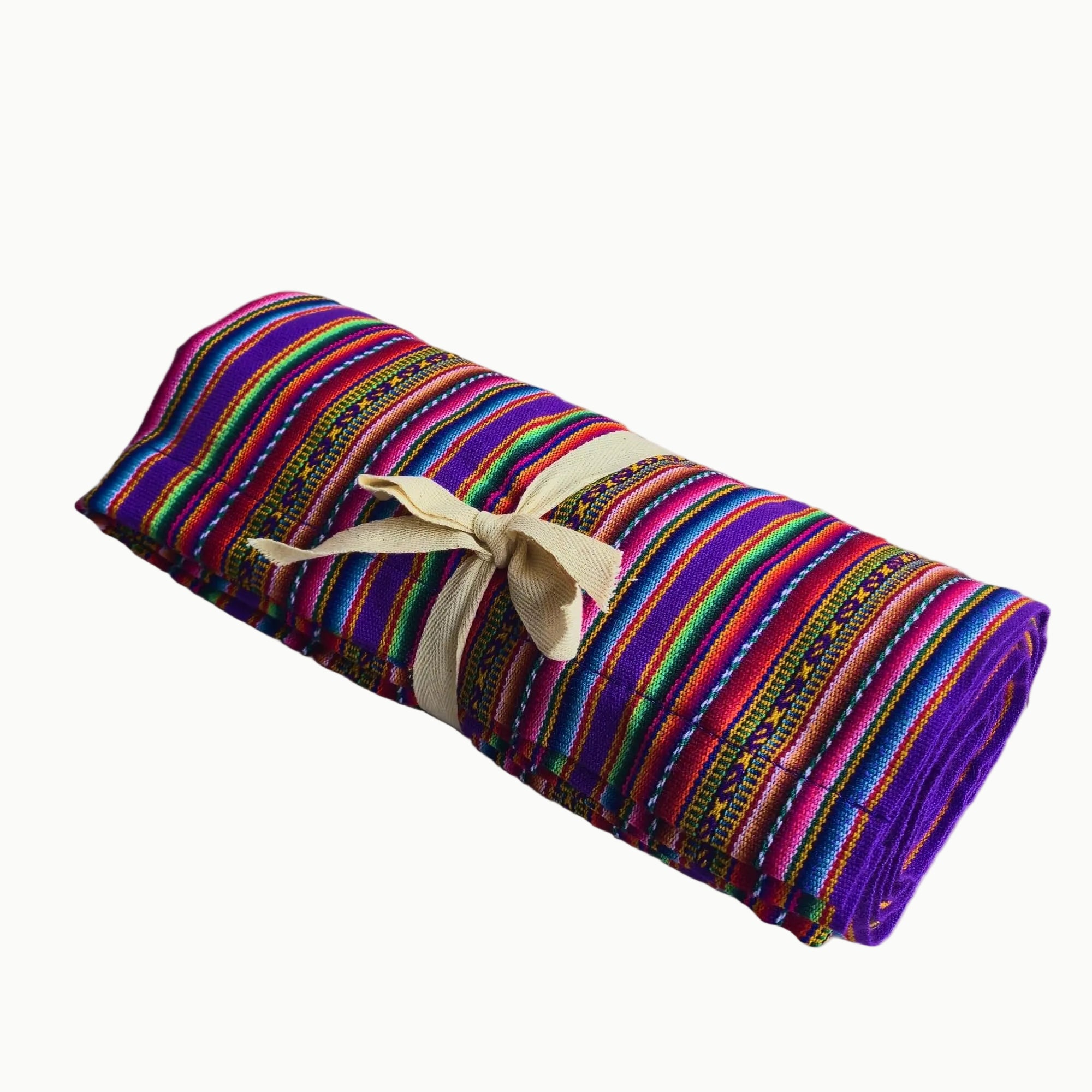 Rolled-up colorful fabric with a beige ribbon on a white background