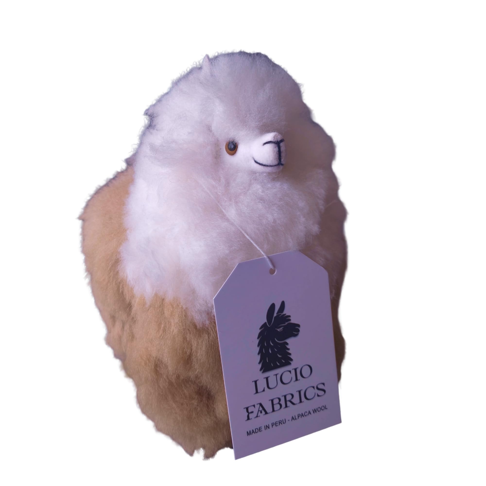 Plush toy resembling an alpaca with a Lucio Fabrics tag on a white background