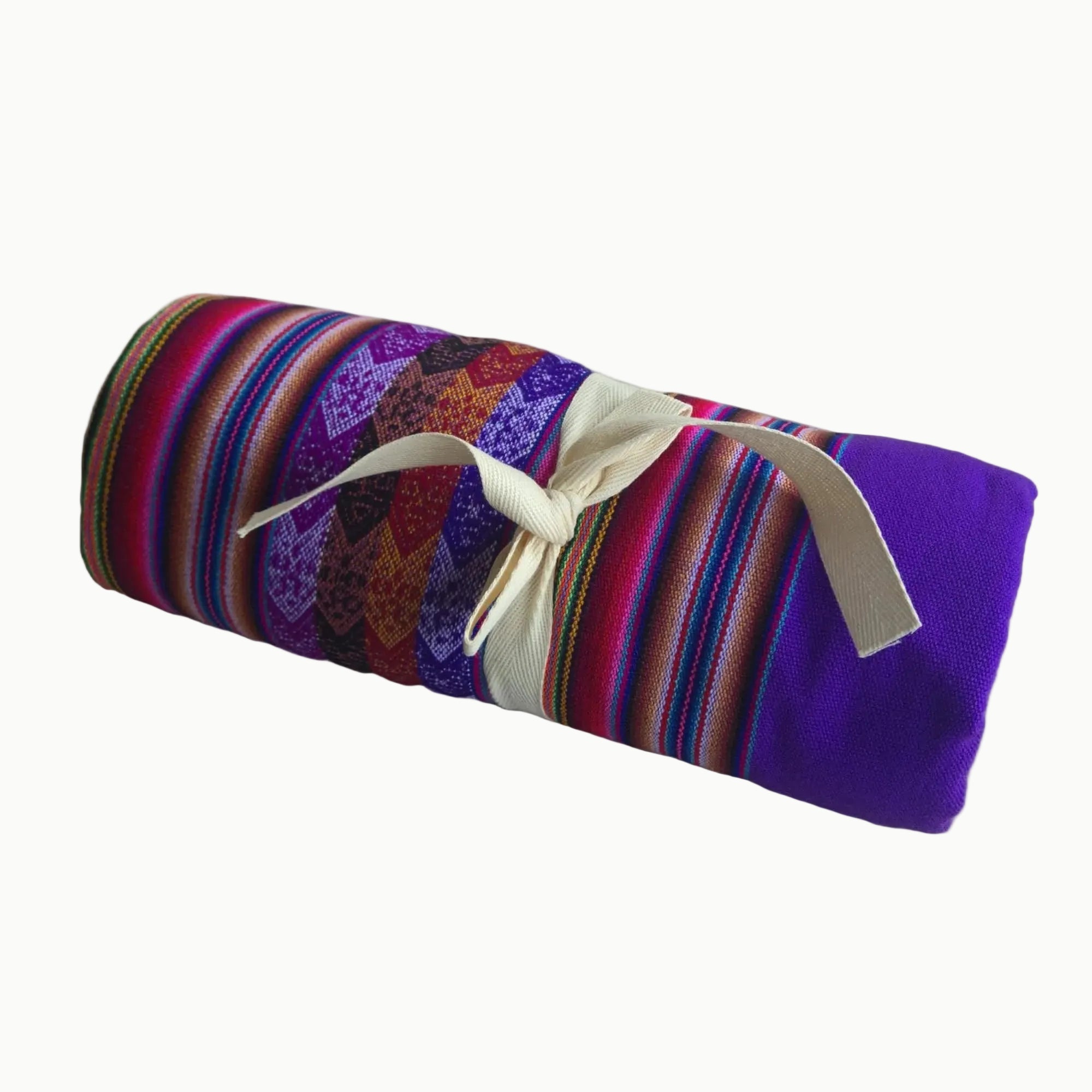 Colorful striped fabric roll with a white drawstring on a white background