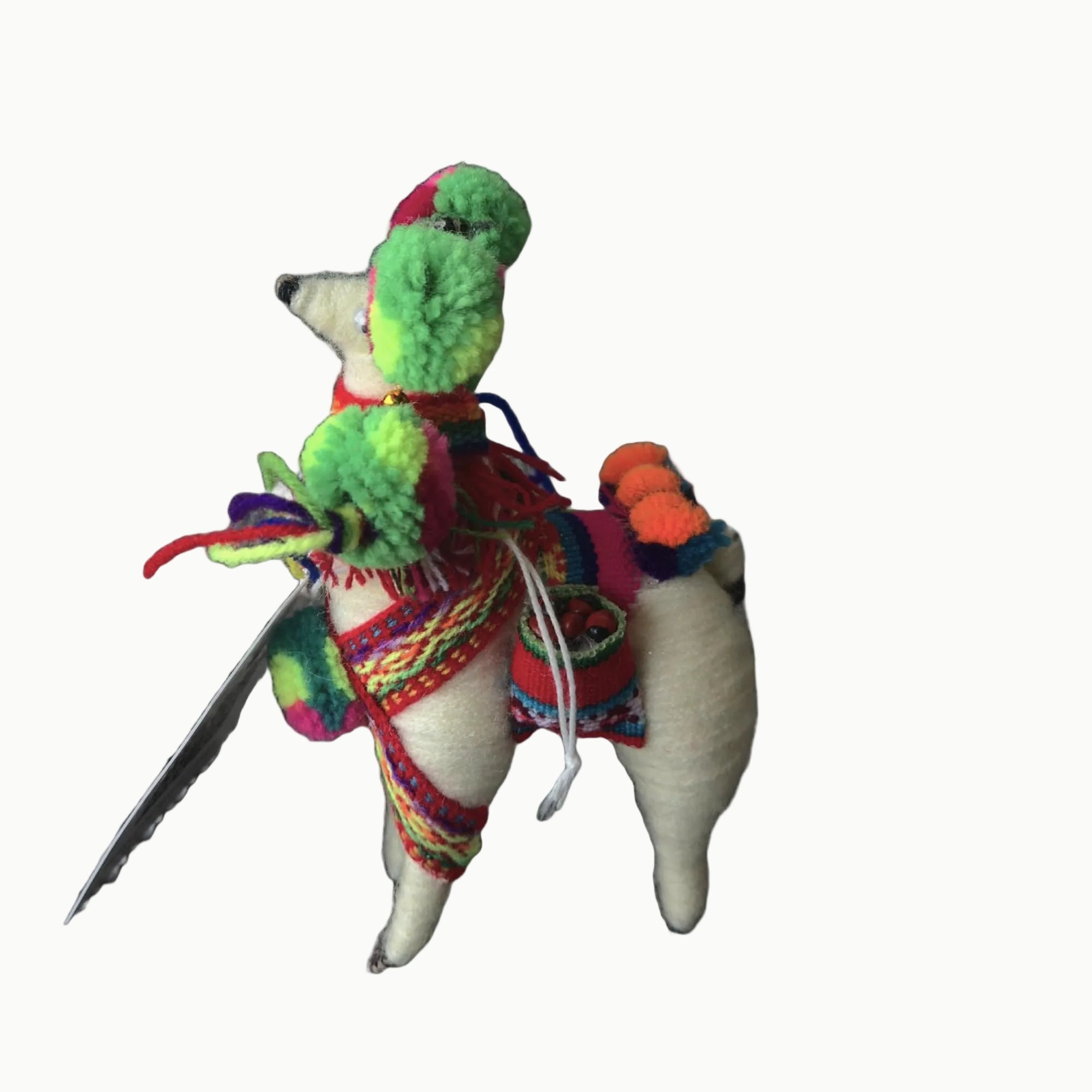 Colorful stuffed animal toy with a sword on a white background
